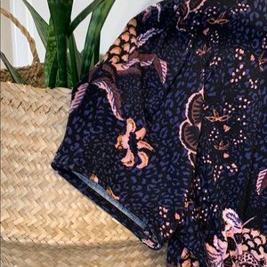 Free people blouse with key hole opening.